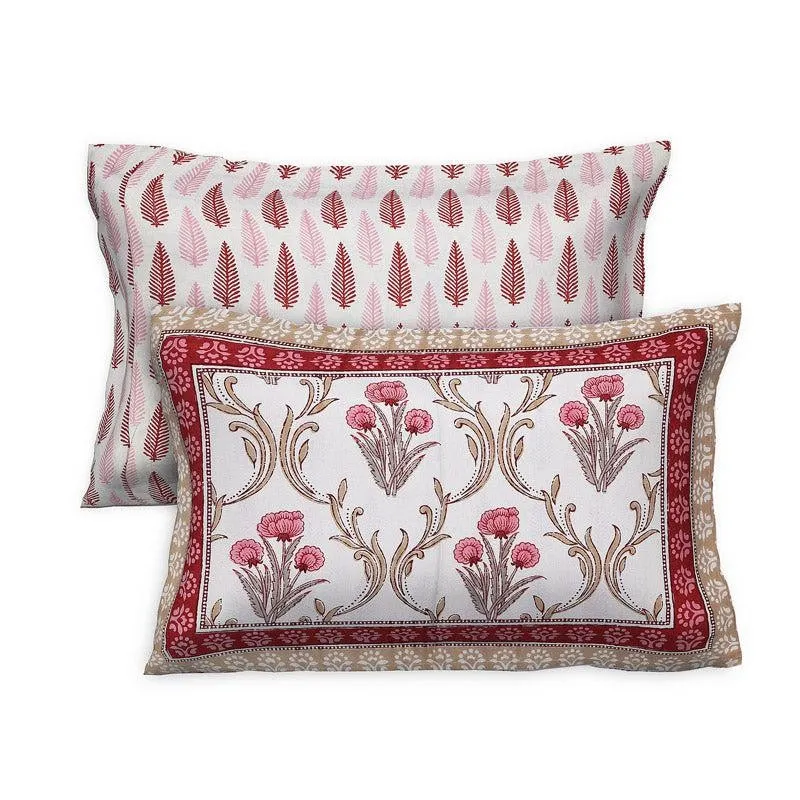 Matching pillow covers with floral and leaf motifs in red, white and beige