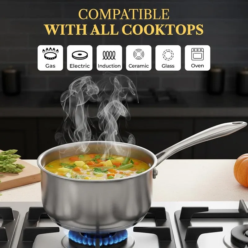 Silver stainless steel saucepan on a gas cooktop with steaming soup