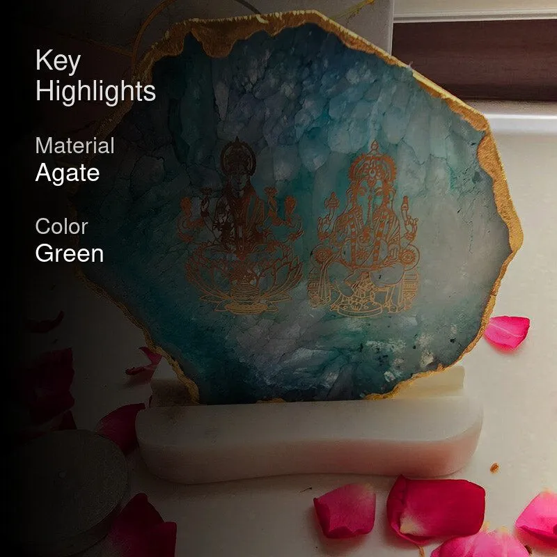 Green agate candle holder with gold-edged slice and deity etchings