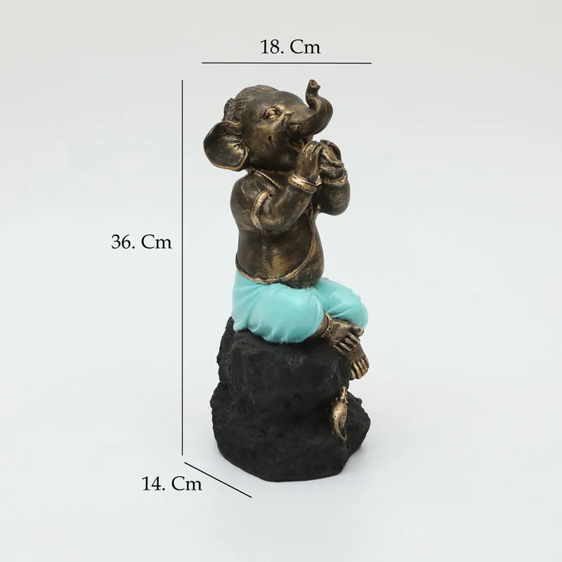 Playful Vinayaka Showpiece - Brown, Blue media 7