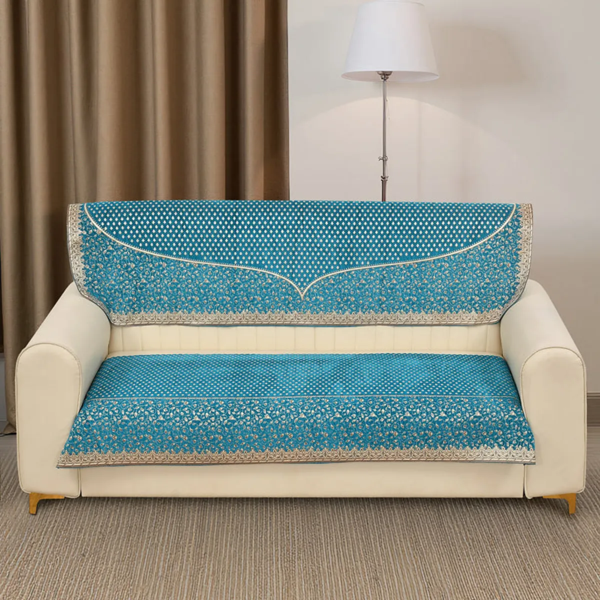 Aqua blue chenille cover displayed on a three-seater sofa