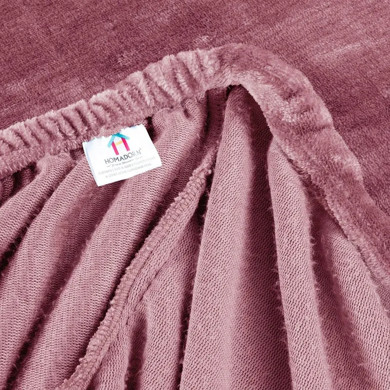 Close-up of the elasticated edge on the pink fitted velvet bedsheet