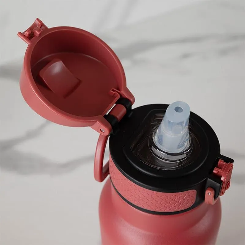 Red insulated bottle with open flip-top lid and drinking spout