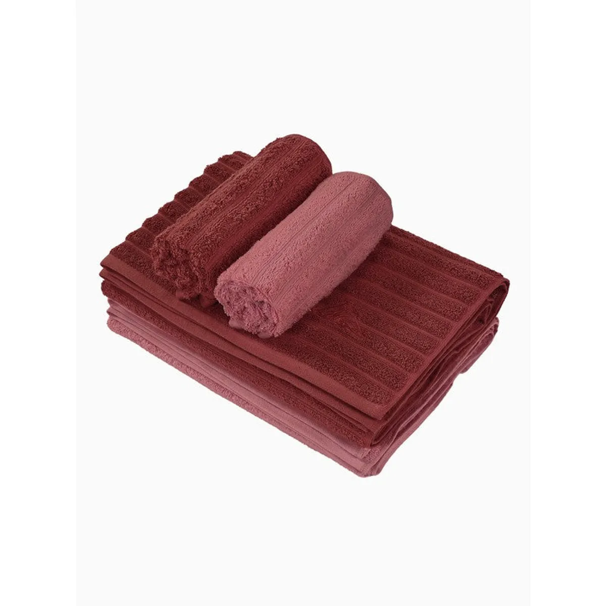 Folded maroon and pink towel set on a white background