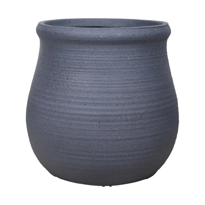 Close-up of a grey urn planter with a matte textured and speckled surface