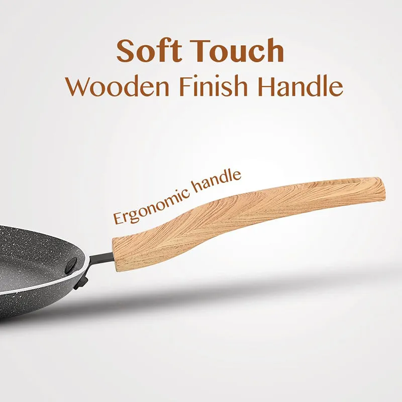 Side view of the tawa showing its curved light wooden-finish ergonomic handle