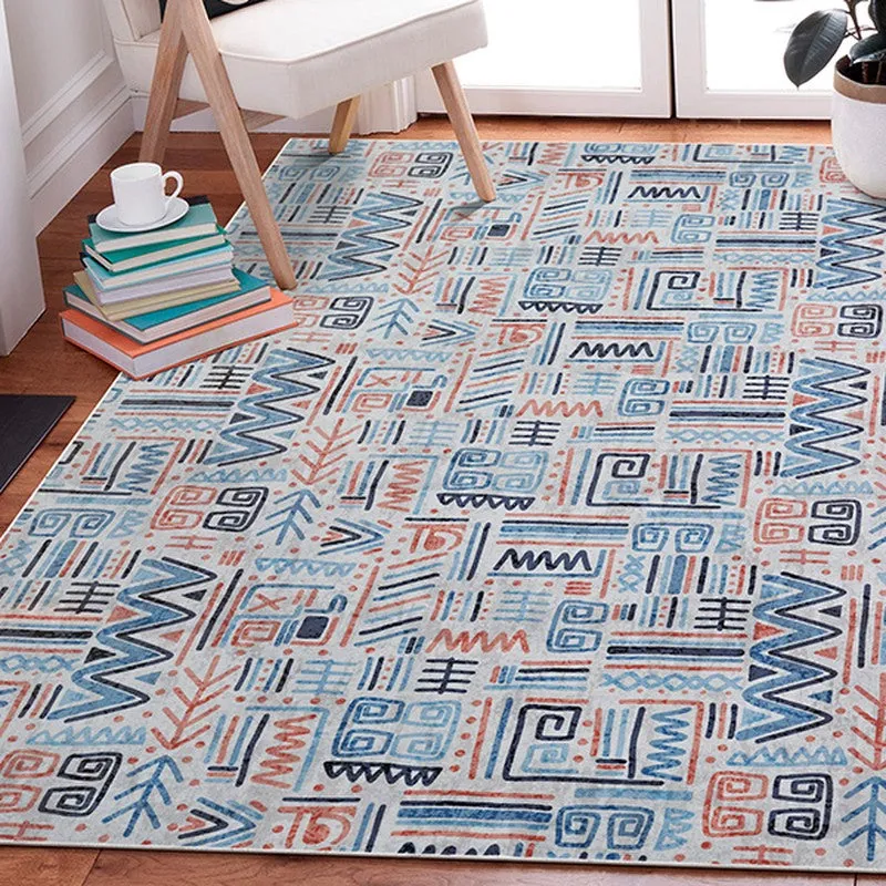 Abstract blue and orange carpet placed beside a chair in a room setting