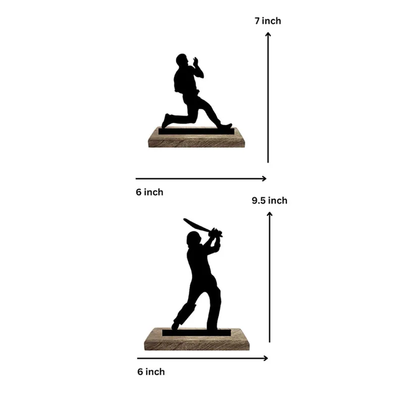 Two cricket figurines on wooden bases shown with printed size arrows