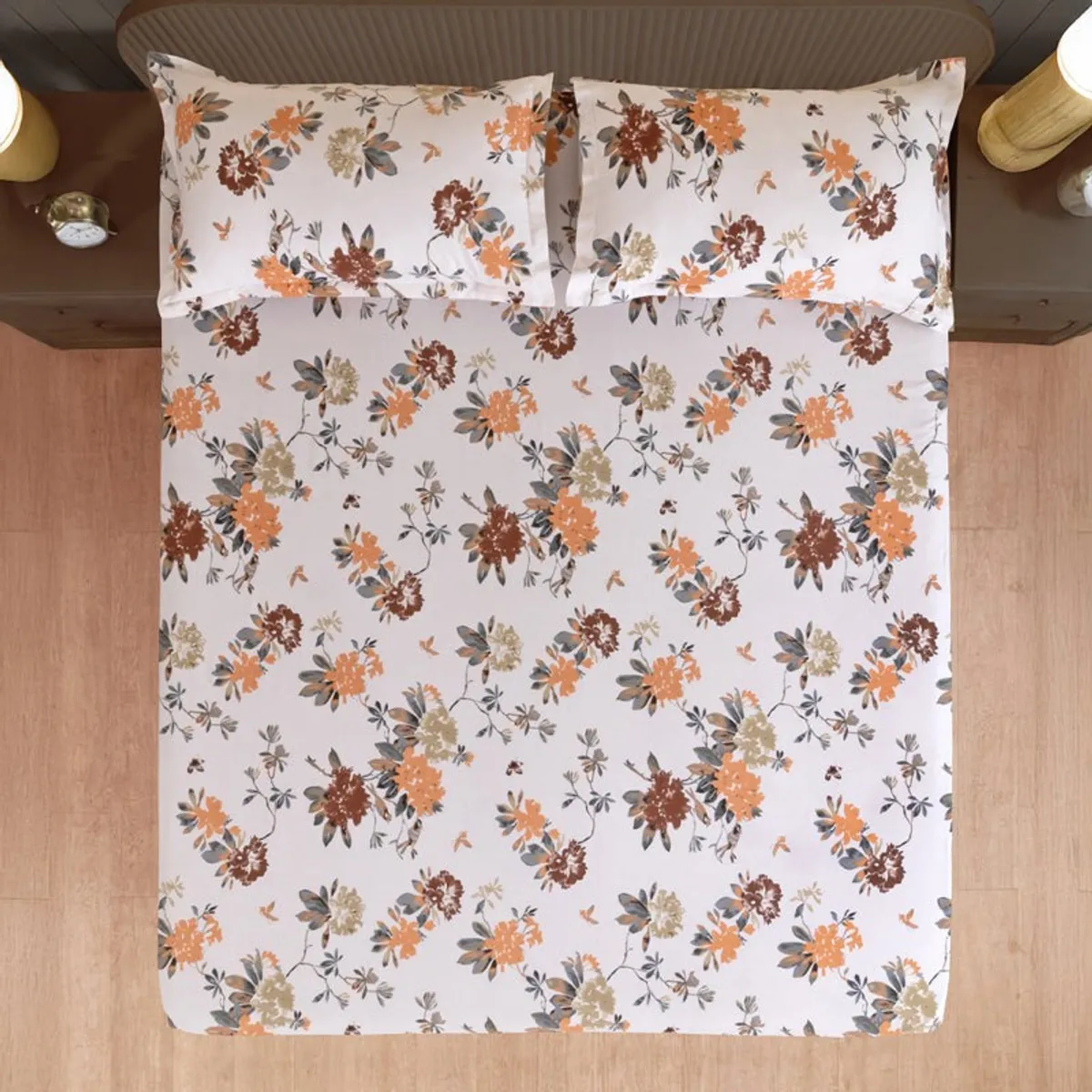 Top view of floral bedsheet with two matching pillow covers