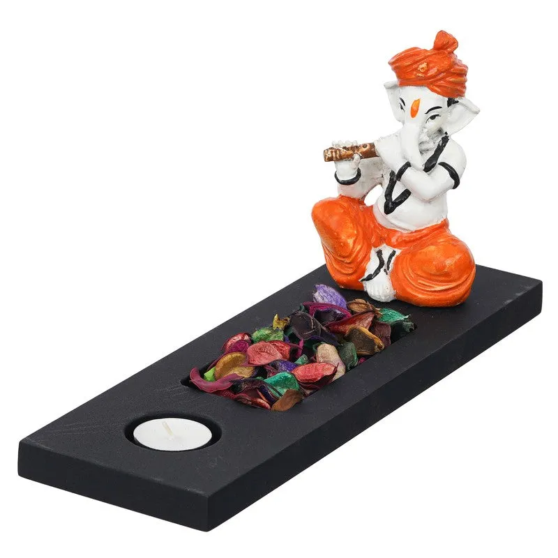 Side view of Ganesha tea light holder with black rectangular platform