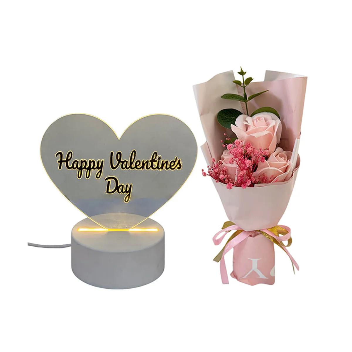 Heart-shaped Valentine's Day showpiece and wrapped pink rose arrangement on a white background.
