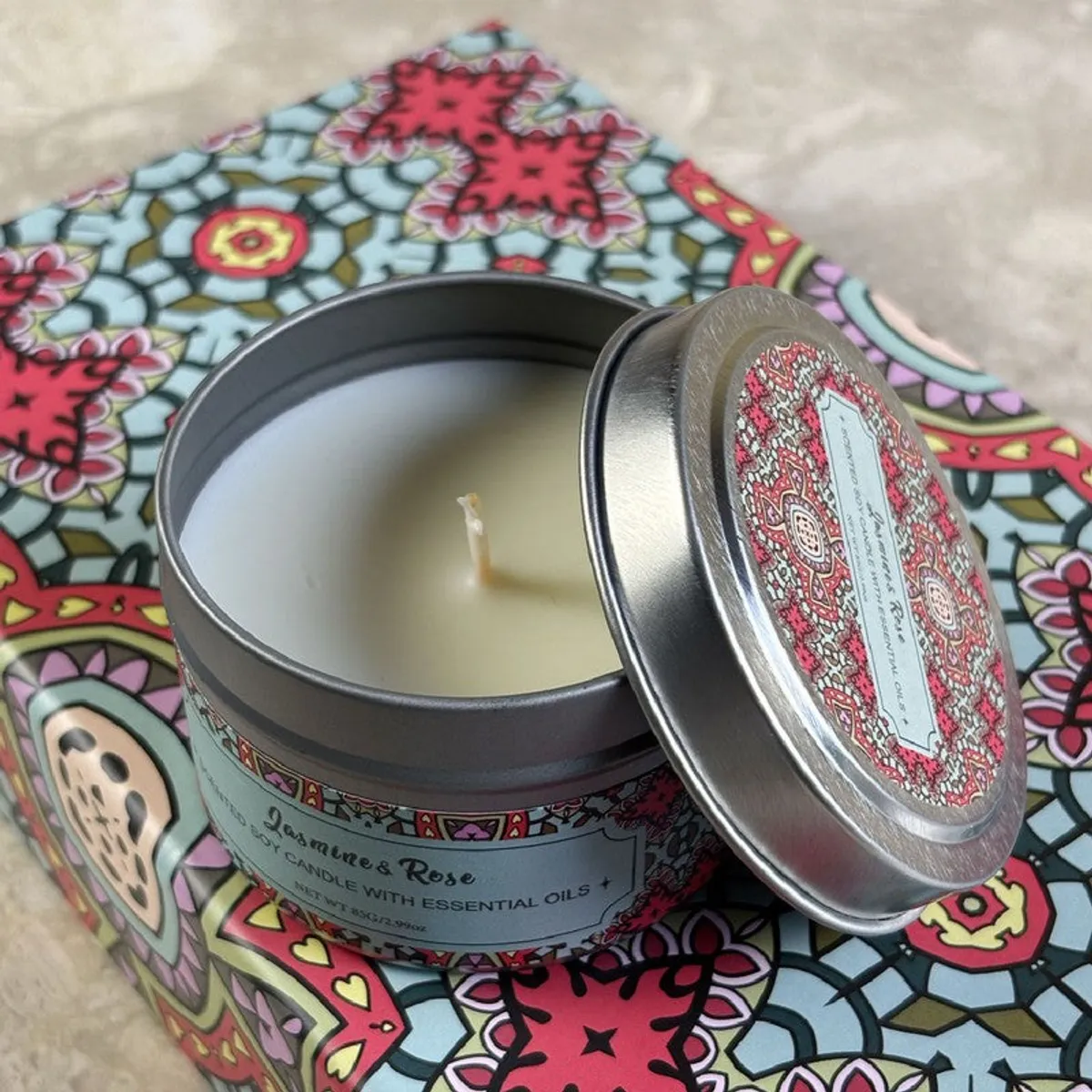 Open scented candle showing pale wax and a central wick