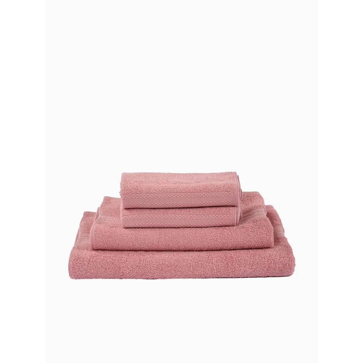 Stacked pink bath and hand towels shown against a white background