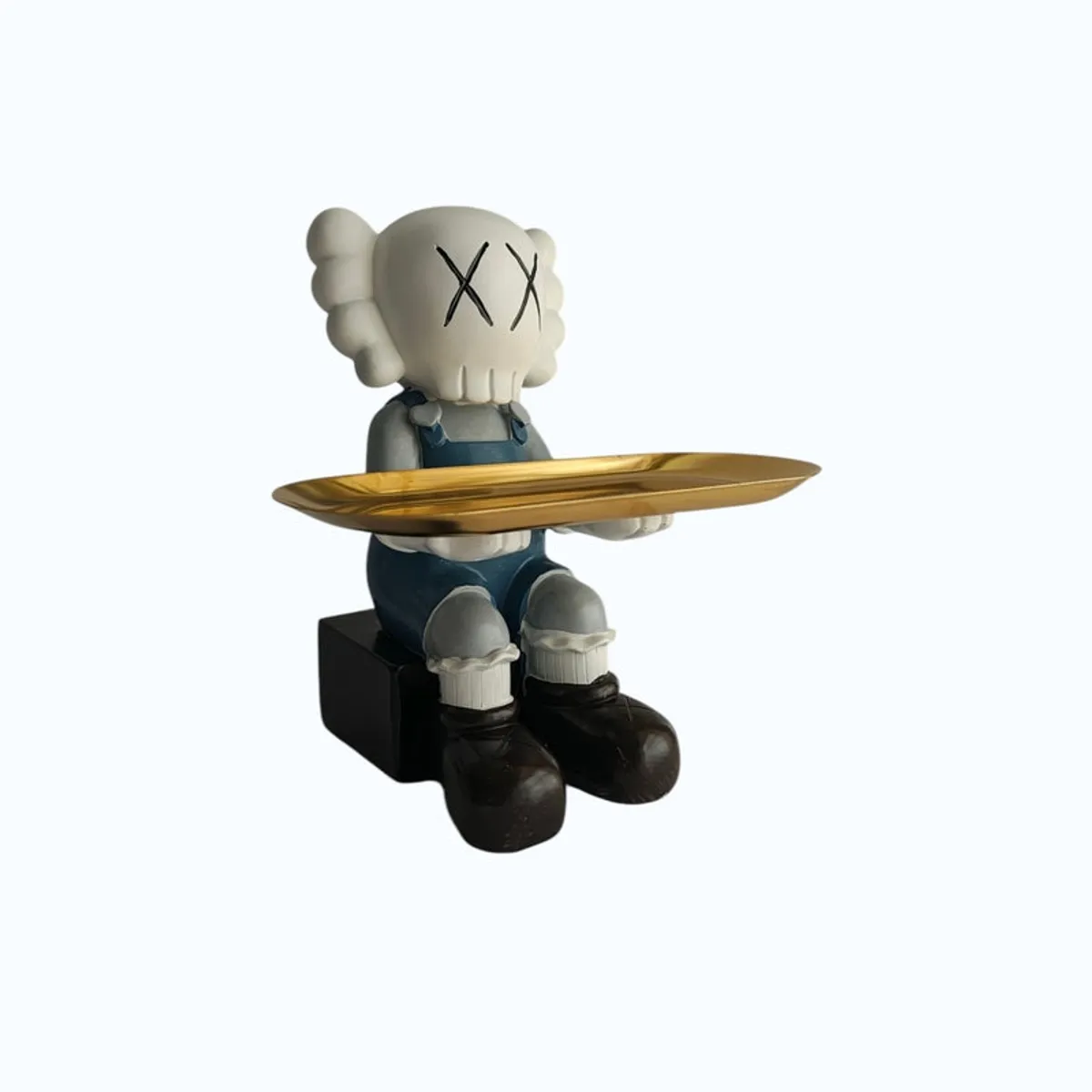 Angled front view of a cartoon figurine with a gold tray