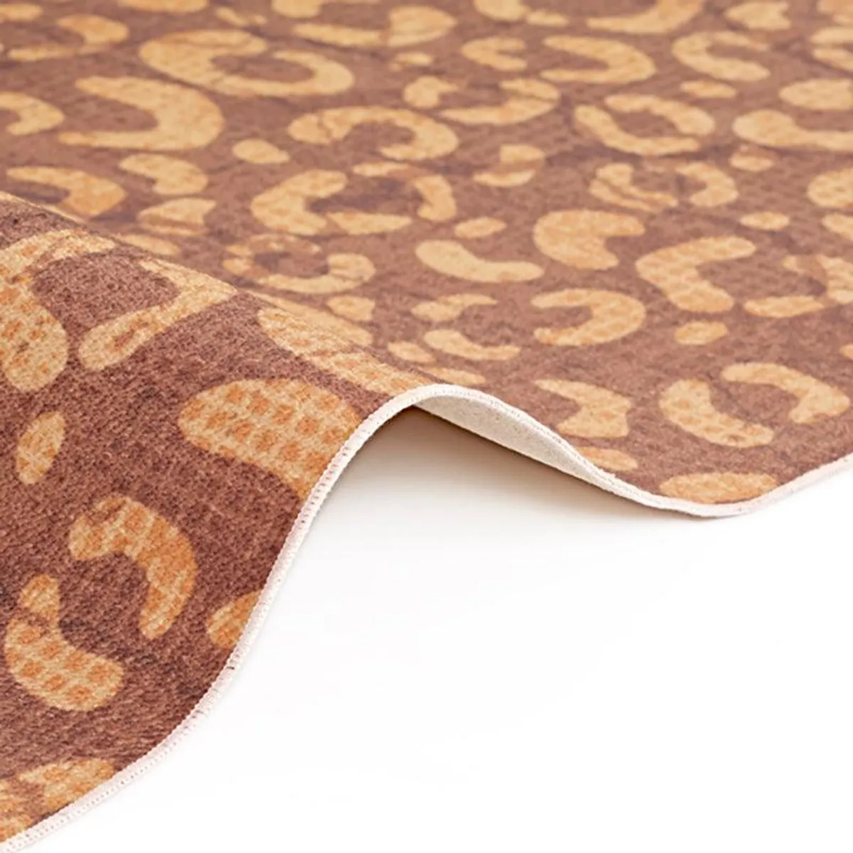 Close-up side view of the carpet edge and surface texture