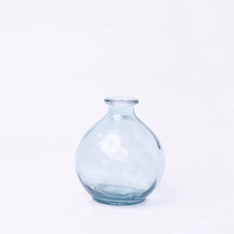 Round pale blue glass vase shown on a plain background