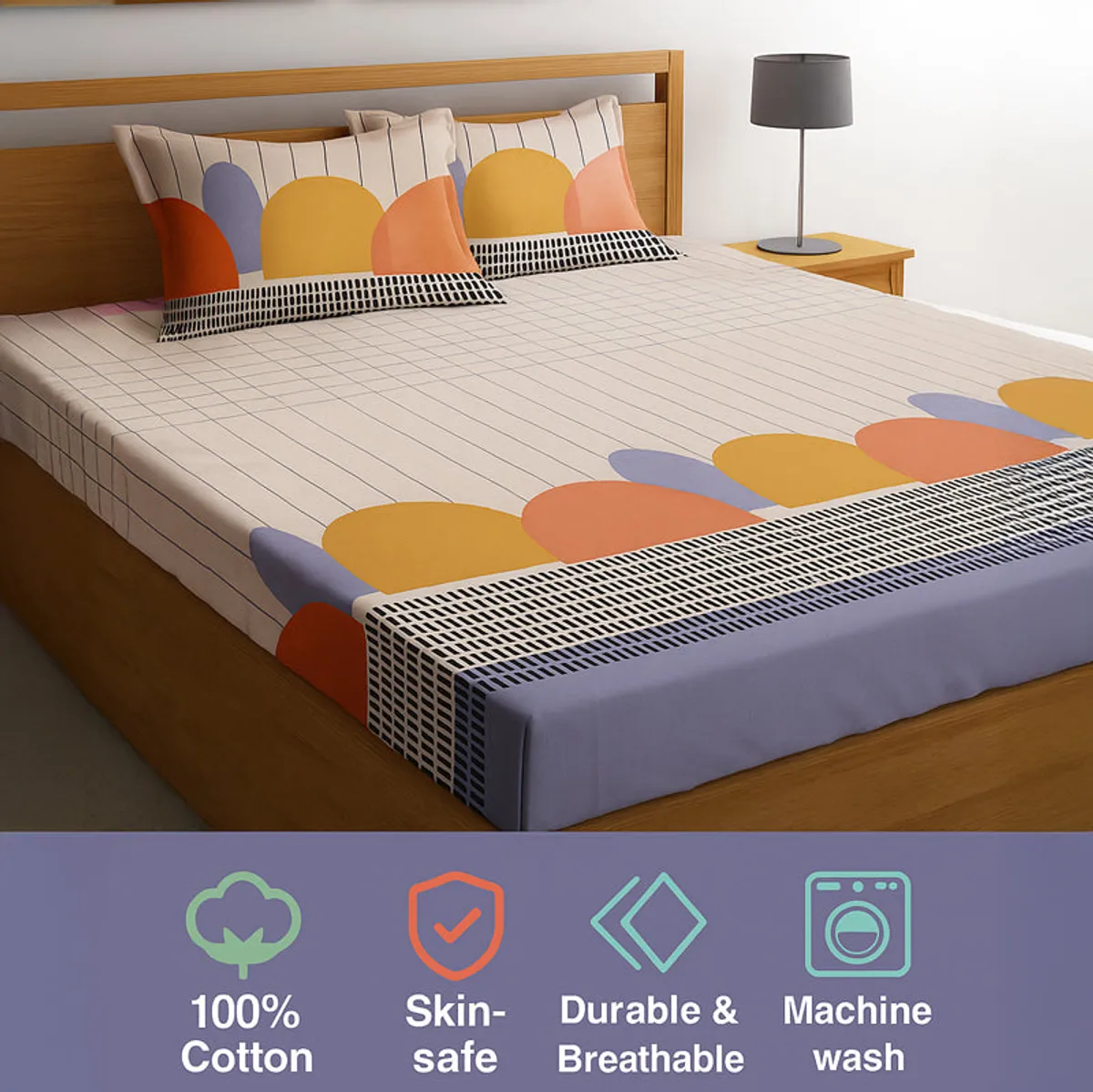 Styled bed with geometric bedsheet and matching pillow covers in beige, peach, yellow and lavender
