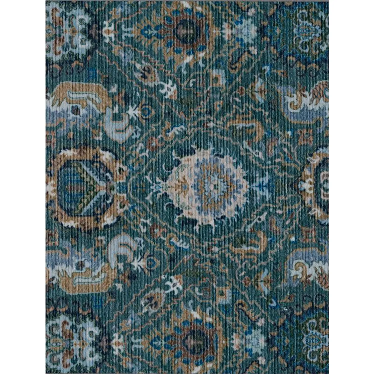Close-up of blue-green carpet with beige ornamental motifs and a subtly ribbed surface