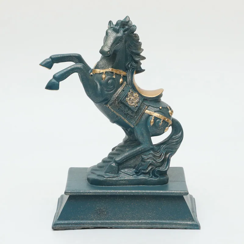 Front view of a grey horse showpiece with gold accents on a pedestal base