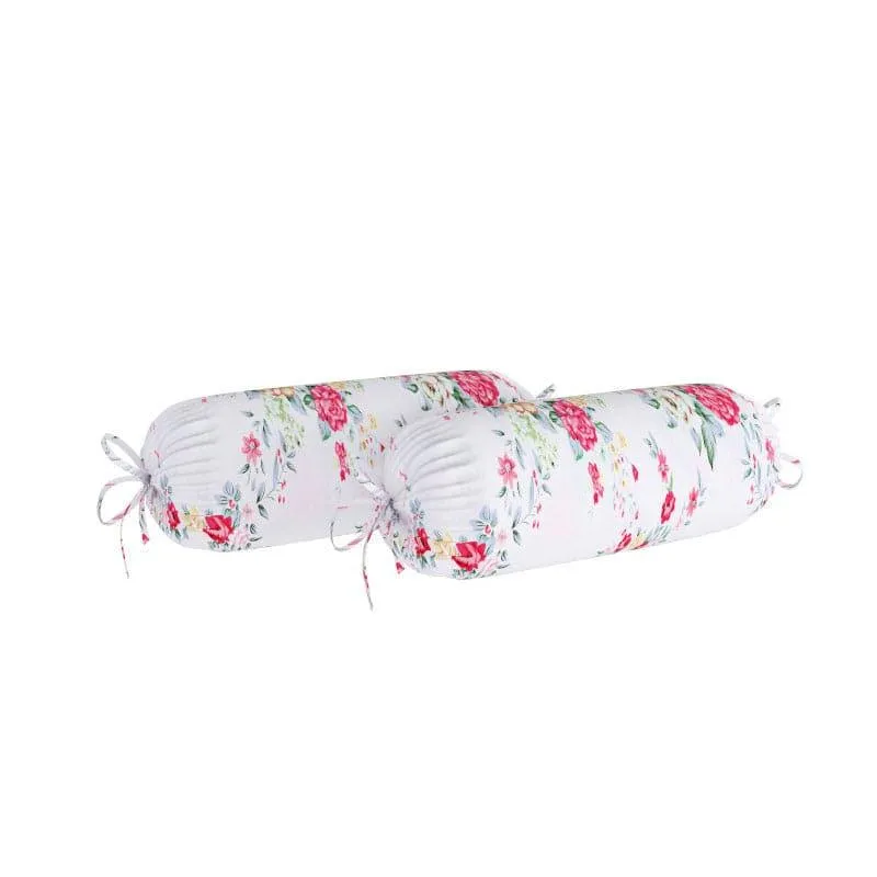 Two floral bolster covers with tie closures on a white background