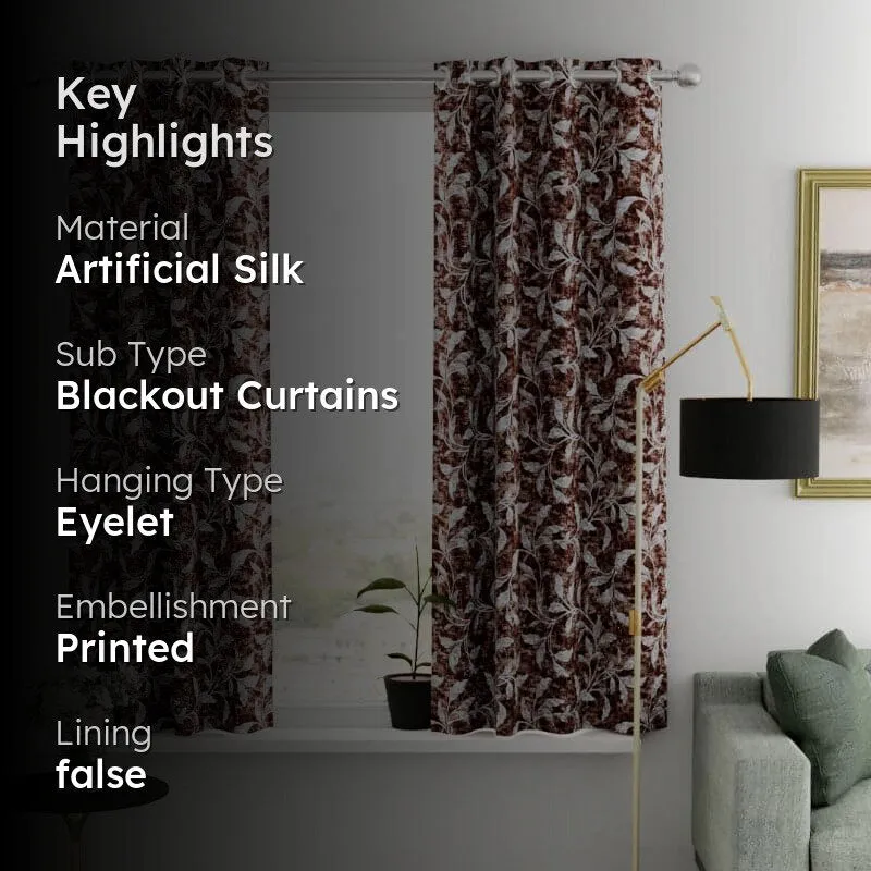 Brown floral curtains displayed in a bright living room with a window and sofa.