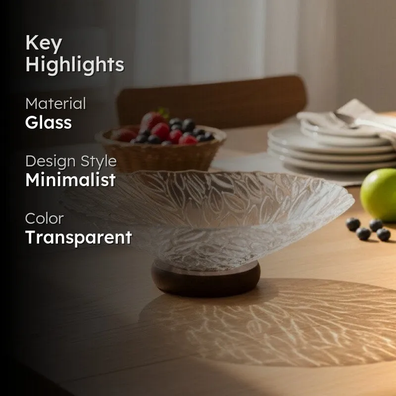Transparent glass fruit bowl displayed on a dining table with highlighted features
