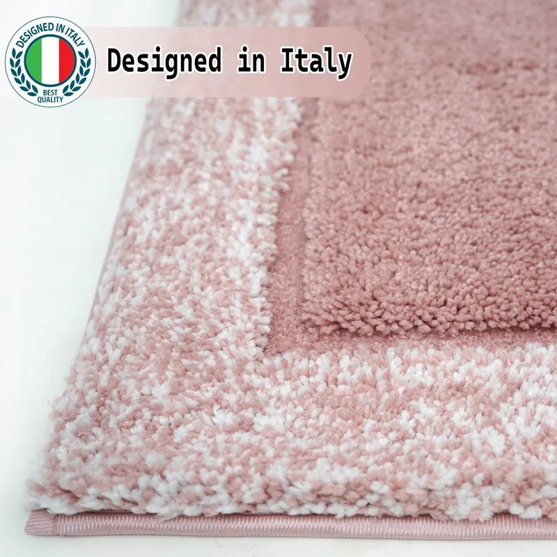 Close-up of the pink runner rug with raised centre and textured border