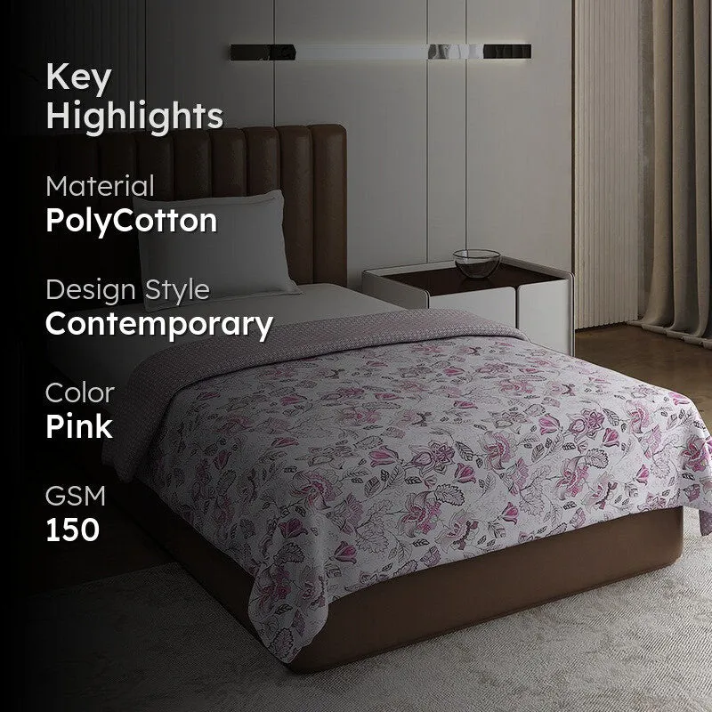 Pink floral dohar styled on a modern bed with bedroom furniture