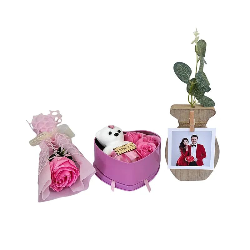 Three-piece pink Valentine gift set isolated on a white background