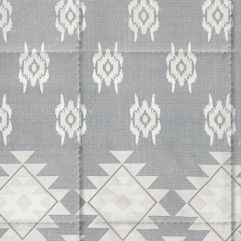 Close-up of the comforter pattern in grey and white