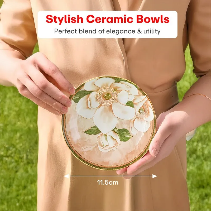 Person holding a floral ceramic bowl outdoors
