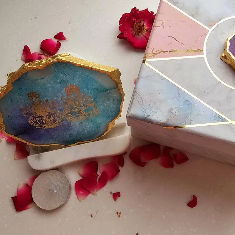 Turquoise agate tealight holder placed beside a decorative box and tealight
