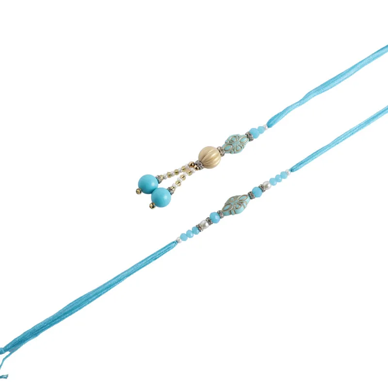 Bhaiya-Bhabhi Rakhi with Roli Chawal - Three Piece Set media 5