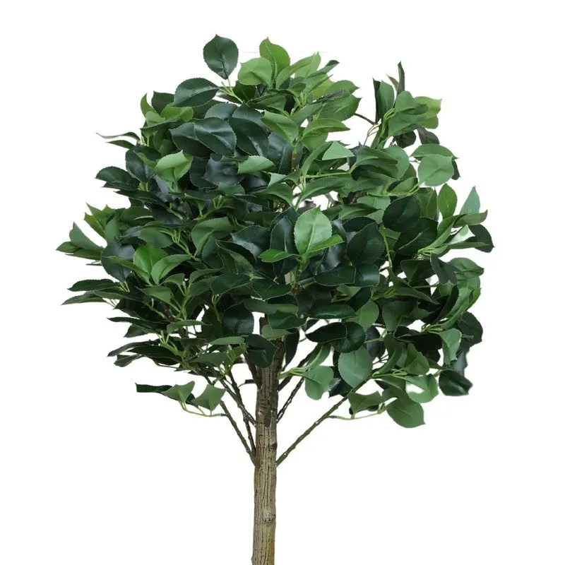 Close view of the dense green camelia leaves on the artificial topiary plant