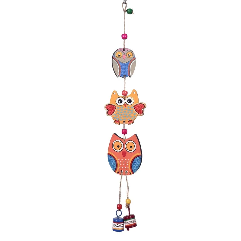 Full view of the colourful owl windchime with two bells at the bottom