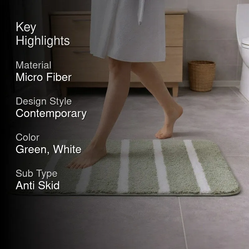 Green and white striped bath mat shown in a bathroom setting