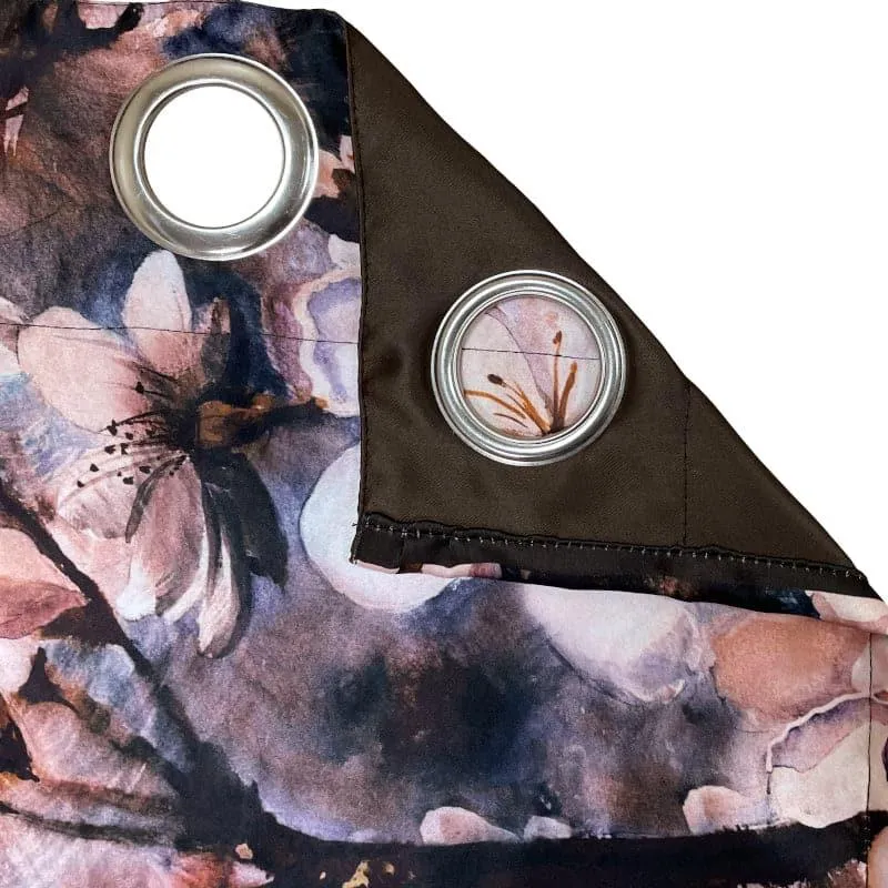 Close-up of floral curtain fabric with metal eyelets and brown backing