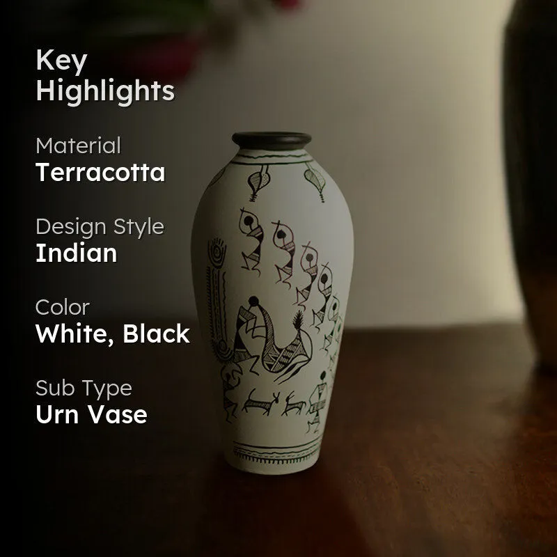 Warli terracotta vase with a highlights text overlay