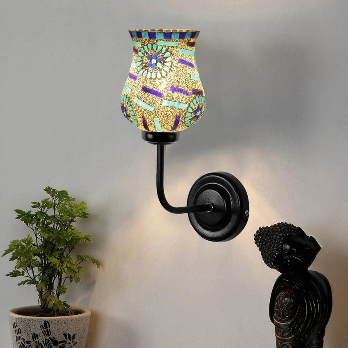 Lit mosaic glass wall lamp with black iron base