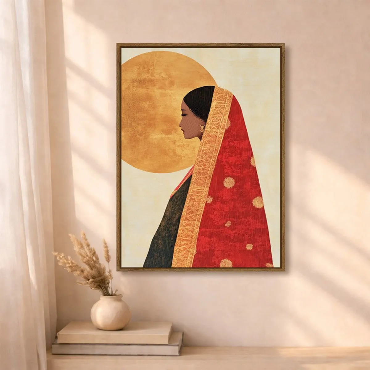 Framed figurative wall art styled above a tabletop with soft sunlight