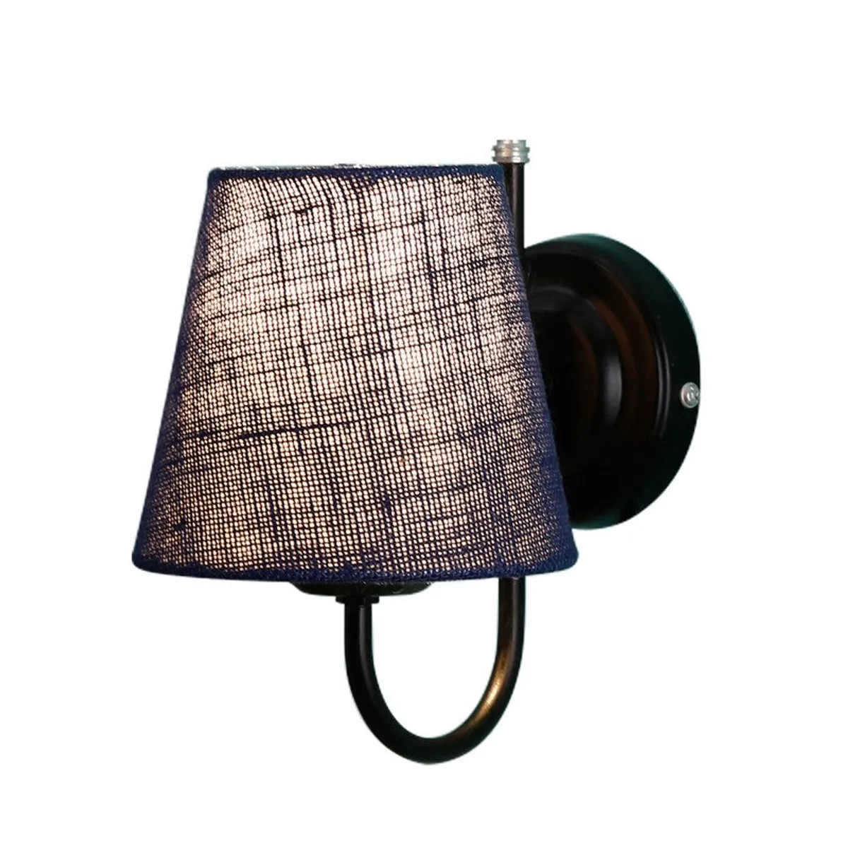 Blue jute wall lamp lit up on a white background