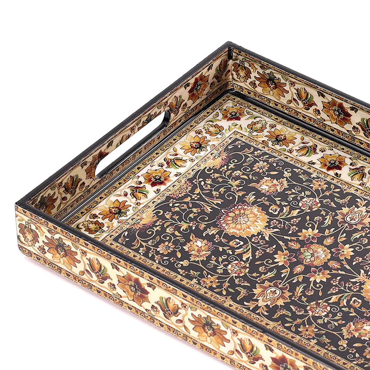 Close-up of the tray's ornate floral border and side handle