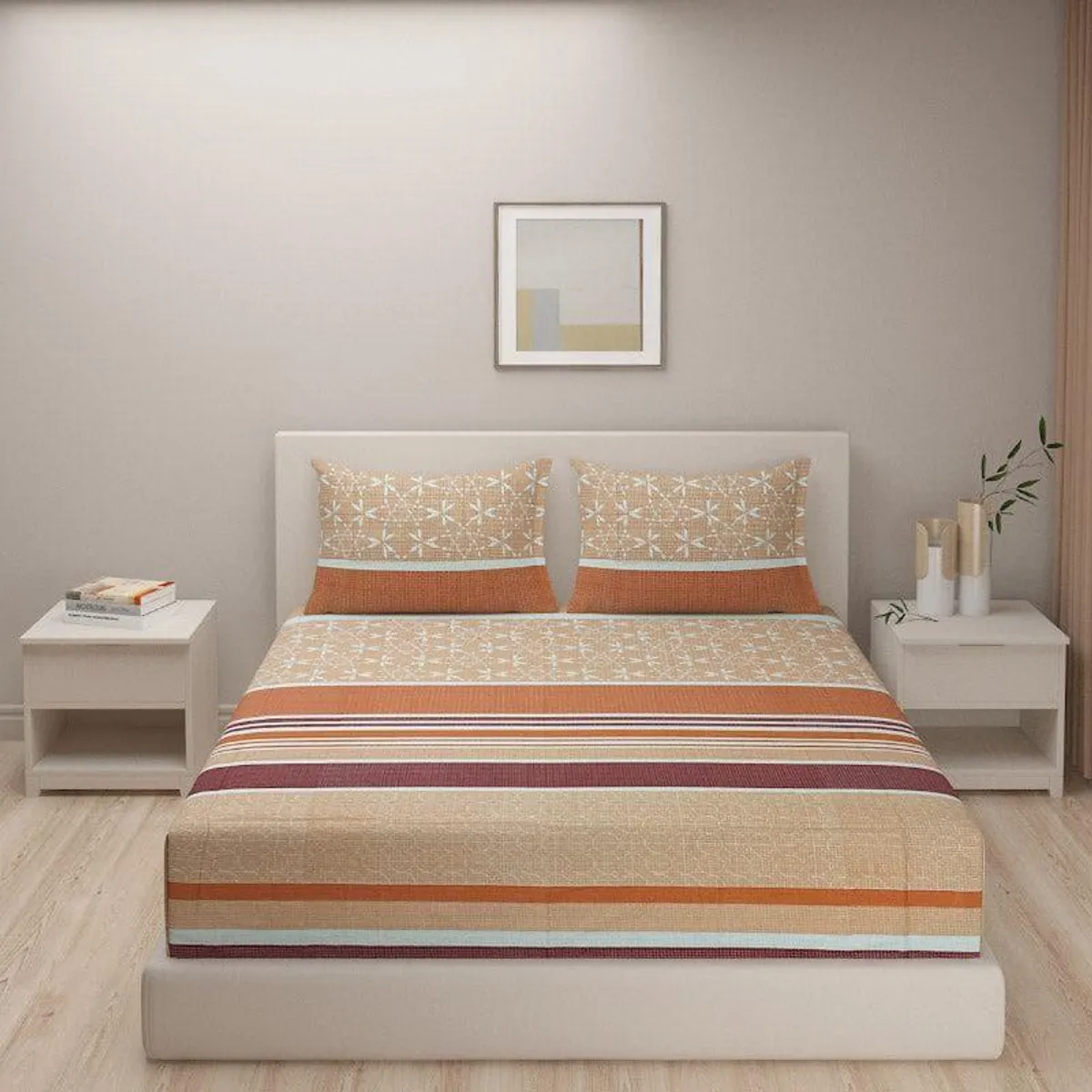 Rust and orange striped bedsheet set styled on a double bed with matching pillow covers