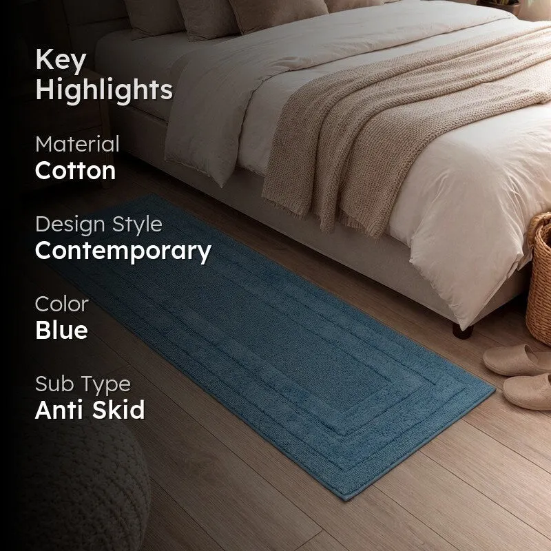 Light blue runner rug beside a bed with key highlights text overlay