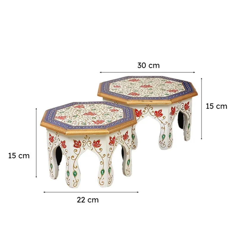 Two multicolour stools shown with their different sizes and matching decorative design