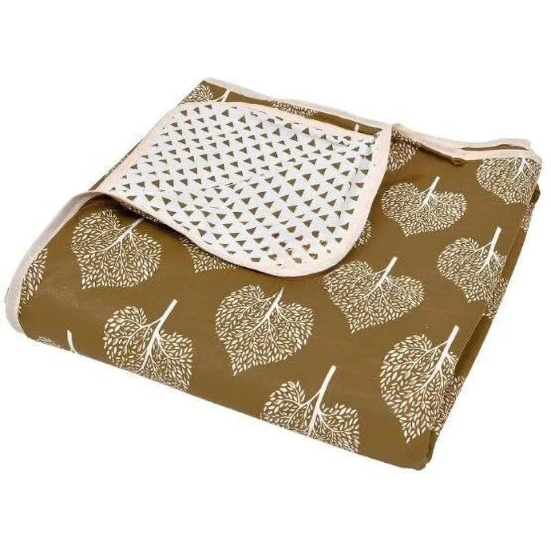 Folded brown reversible dohar showing contrasting patterned sides