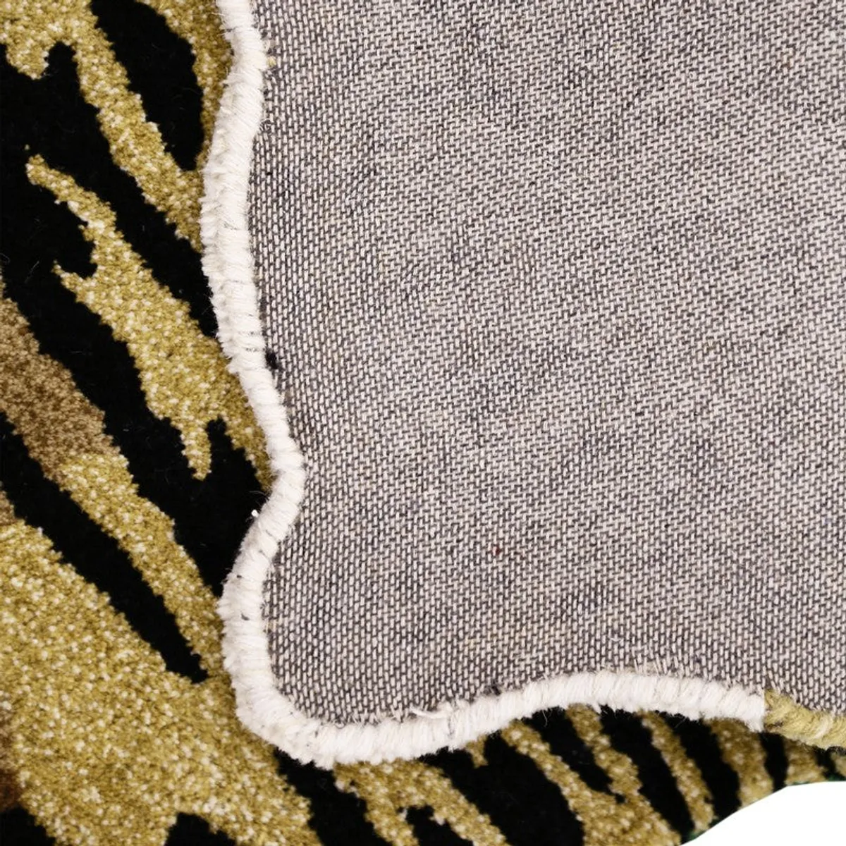 Close-up of the carpet underside and bound edge