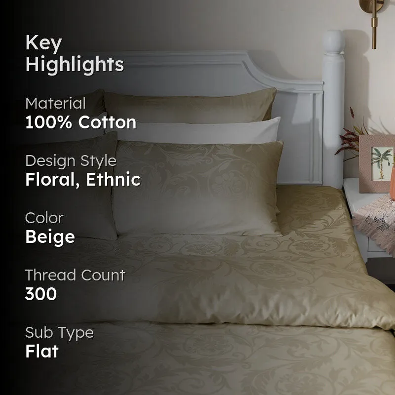 Beige floral bedsheet on a bed with text overlay