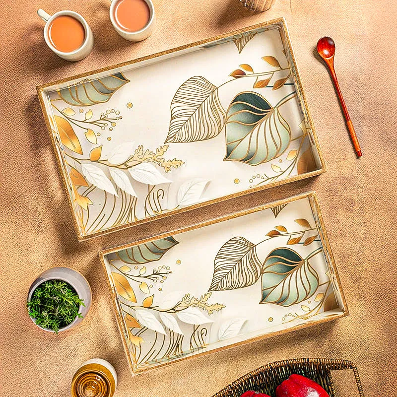 Top view of two rectangular botanical serving trays in large and medium sizes