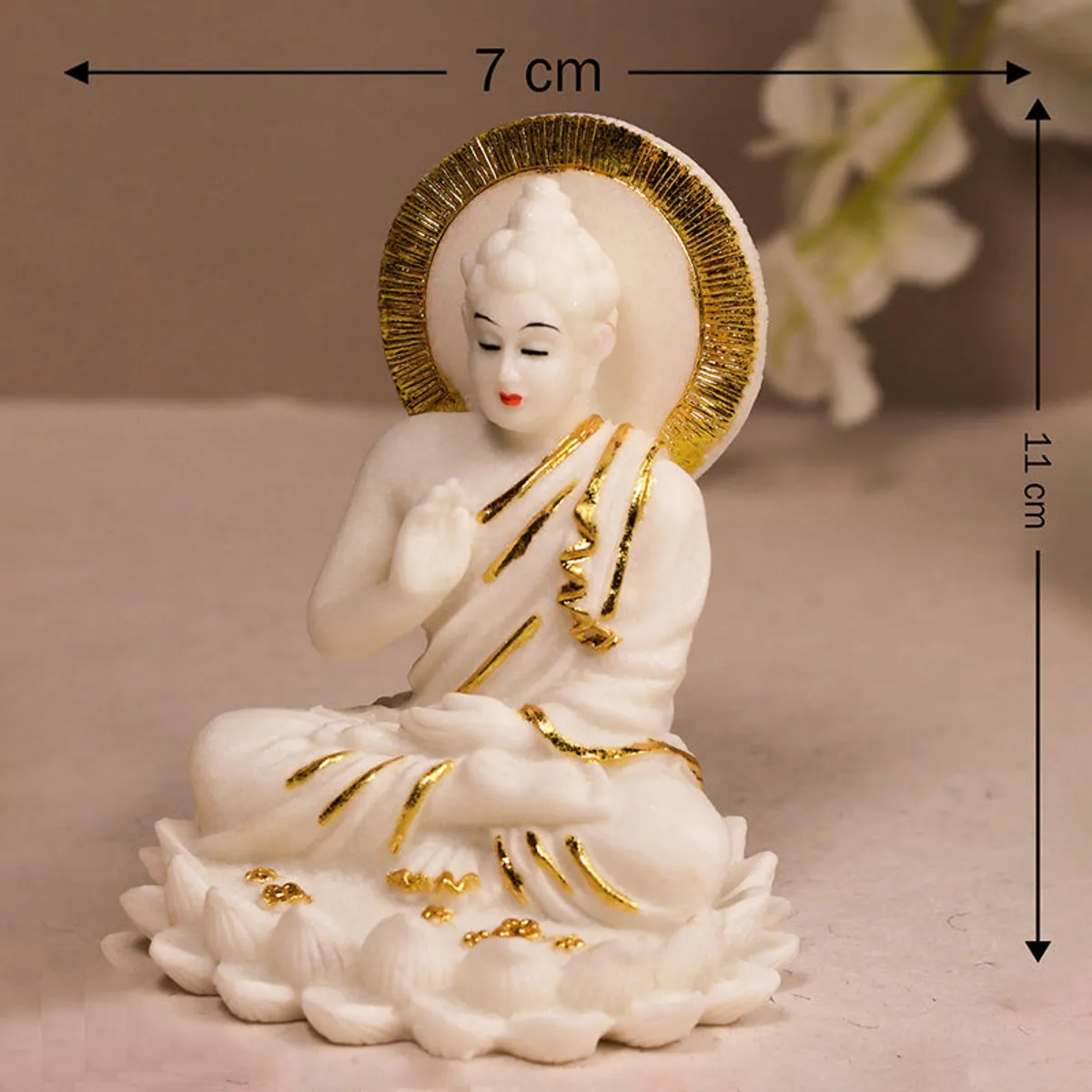 White and gold Buddha showpiece shown with dimension arrows
